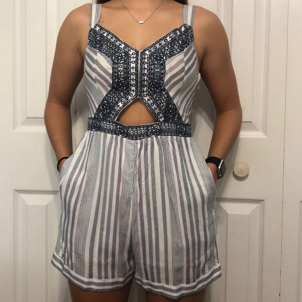 Grey, white, and purple romper.